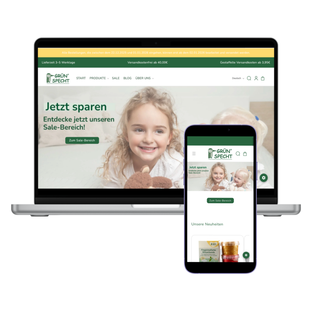 strg-S Webdesign mit Sinn Ein Laptop und ein Smartphone zeigen dieselbe Homepage mit einem lächelnden Kind, einem Teddybär und einem Werbetext zum Thema Sparen. WordPress, Shopify